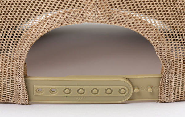 Close up view of tan mesh back and adjustable fit on Shooting Sportsman olive green hat.
