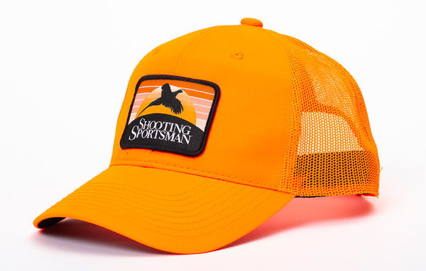 Shooting Sportsman hat with blaze orange bill, cap, and mesh back with Shooting Sportsman signature pheasant patch on the front